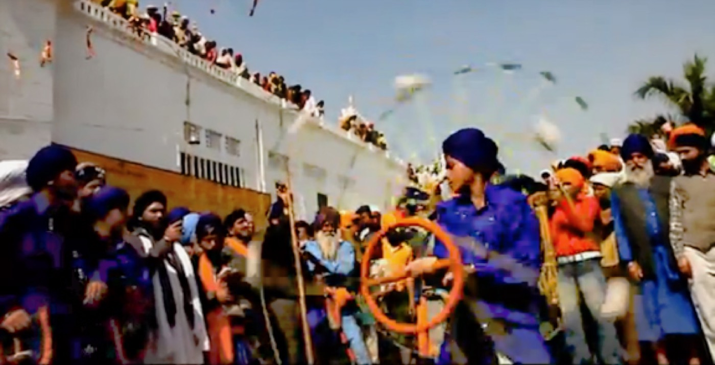 Sikh warriors performing gatka martial arts during Hola Mohalla at Anandpur Sahib